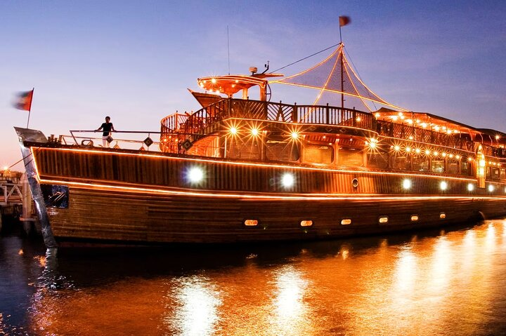 Experience the charm of a luxurious Dhow Cruise dinner gliding past Dubai’s skyline while savoring gourmet cuisine and enjoying live entertainment under a mesmerizing twilight sky.